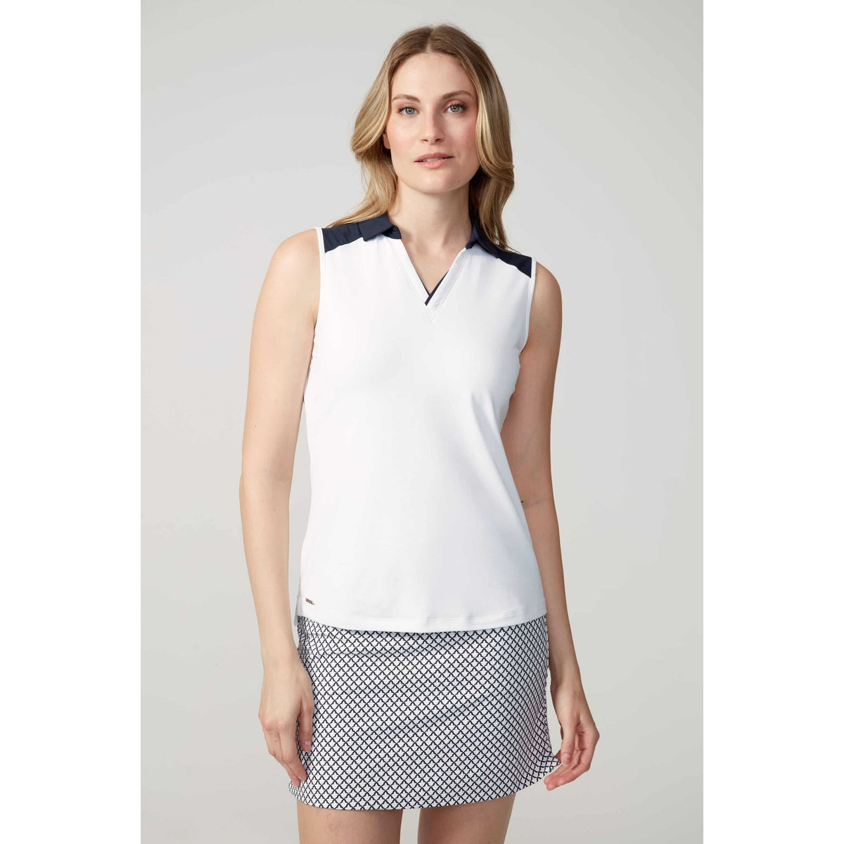 POLO SANS MANCHES SWING CONTROL AVEC CONTRAST